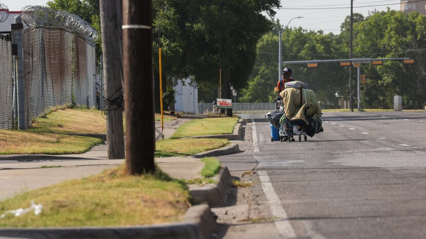 Bobby Hughes made his way down South Malcolm X Boulevard to a new place to set up camp,...