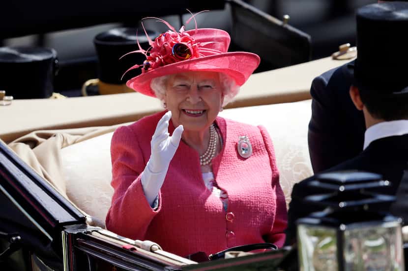 FILE - Britain's Queen Elizabeth II arrives on the third day of the Royal Ascot horse race...