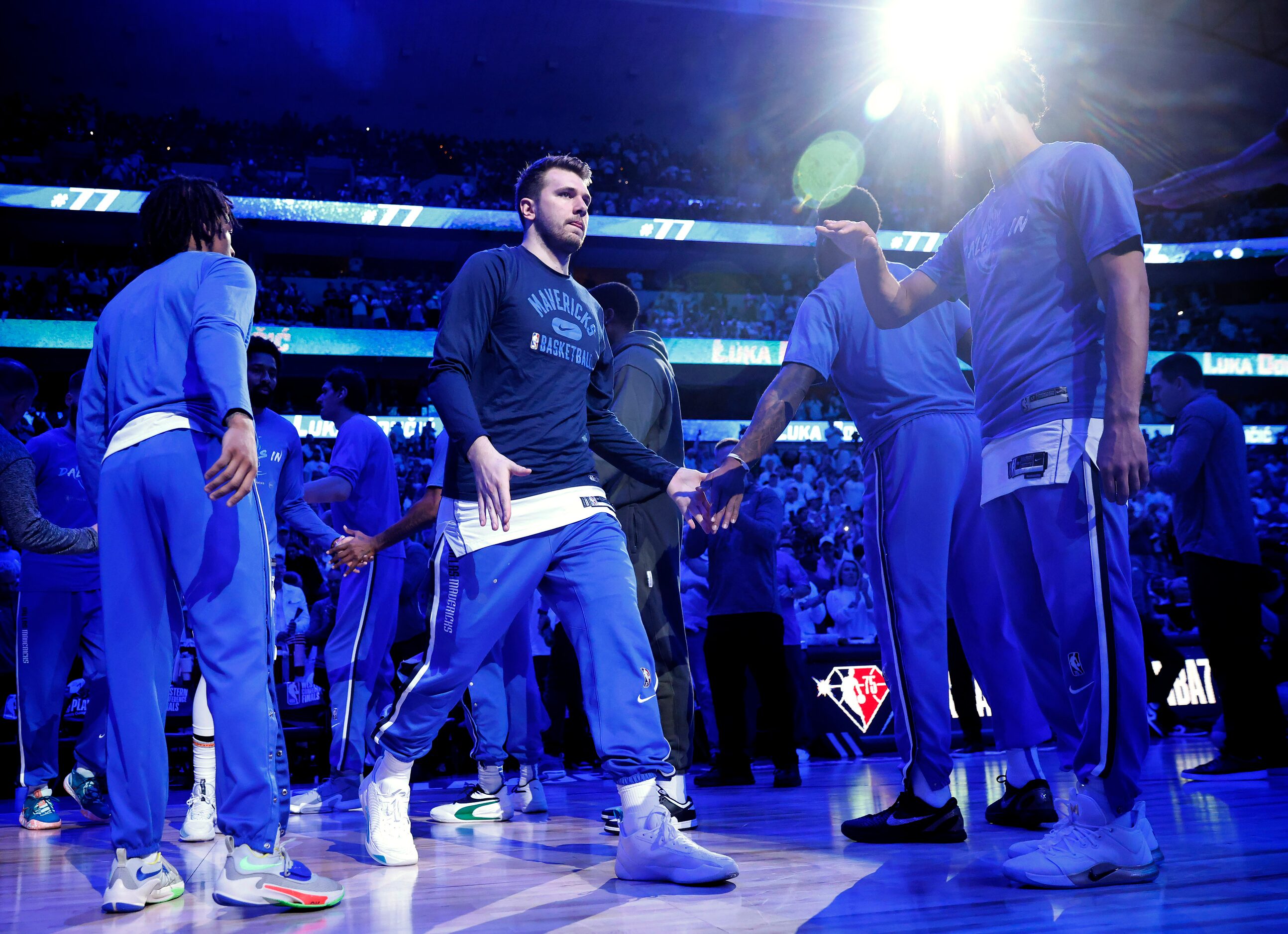 Dallas Mavericks guard Luka Doncic (77) is introduced before facing the Golden State...