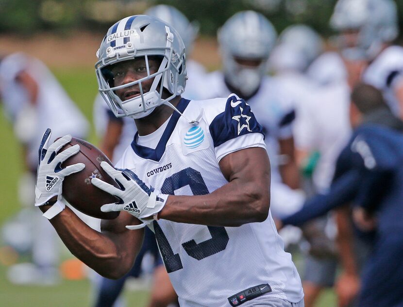 Dallas Cowboys wide receiver Michael Gallup (13) catches a pass during Dallas Cowboys OTA...