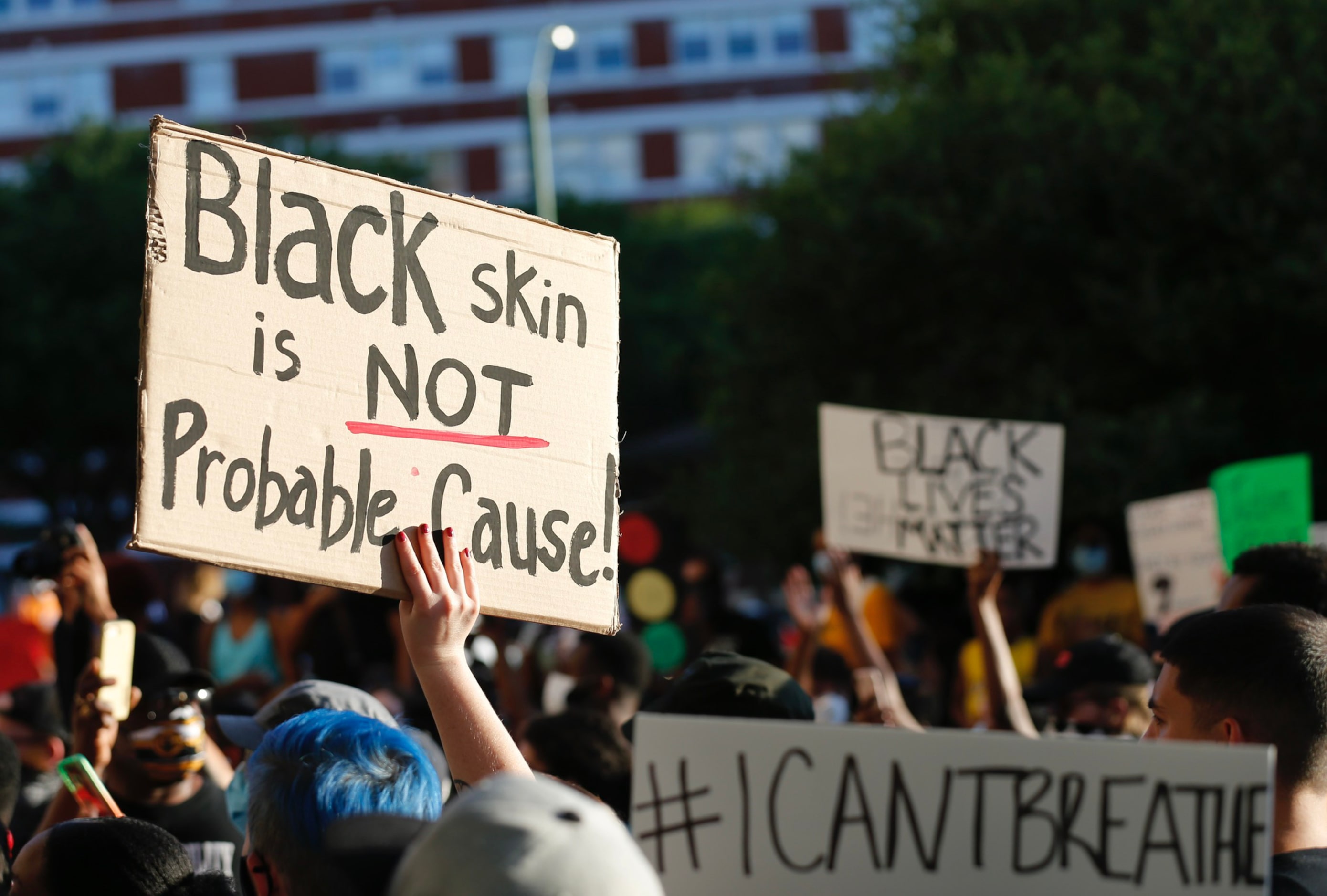 Protesters rally in downtown Dallas during a demonstration against police brutality.