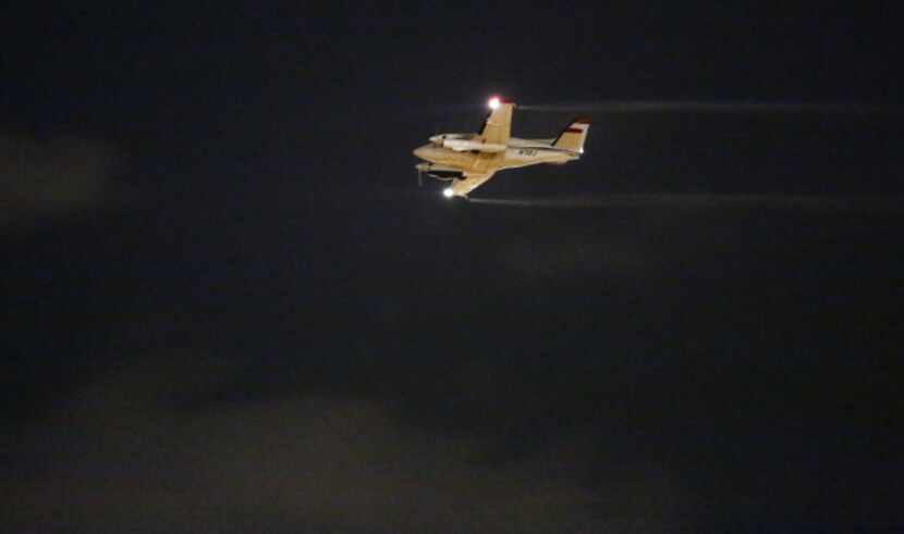 A plane sprayed insecticide over Garland on Aug. 17, part of the effort to curb the spread...