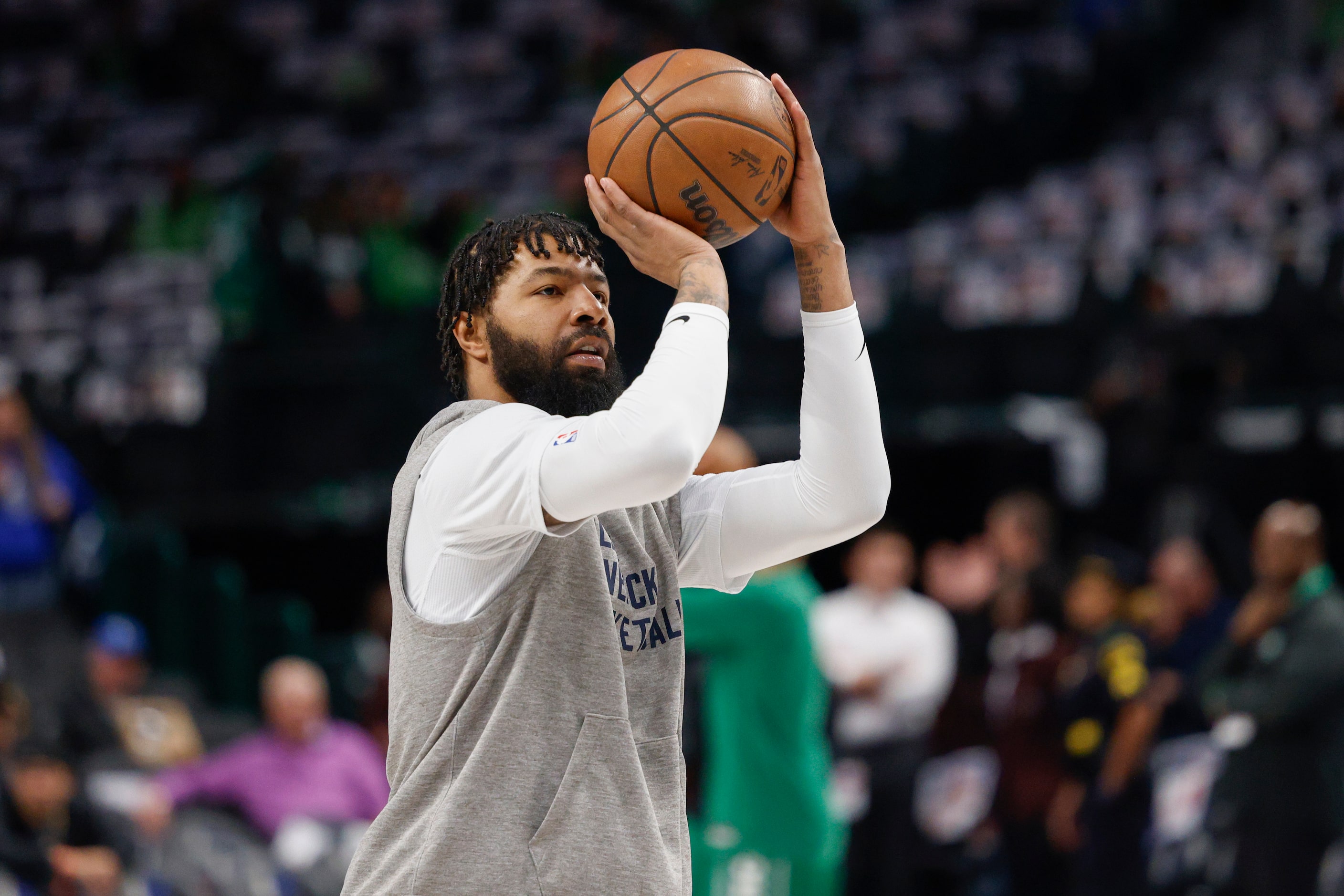 Dallas Mavericks forward Markieff Morris shoots the ball before an NBA game against the...