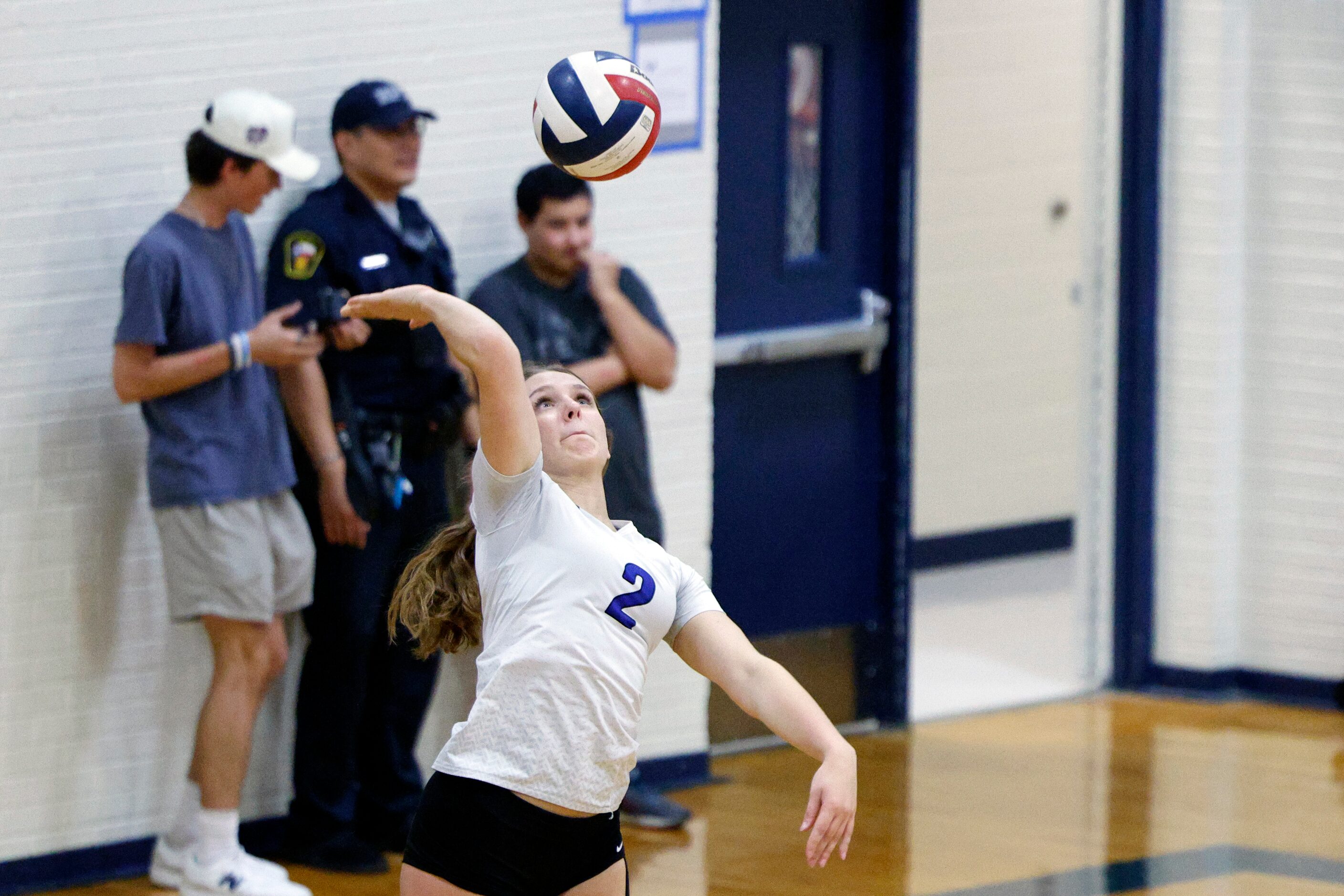 Trophy Club Byron Nelson's Kylie Kleckner (2) serves during a volleyball match against L.D....