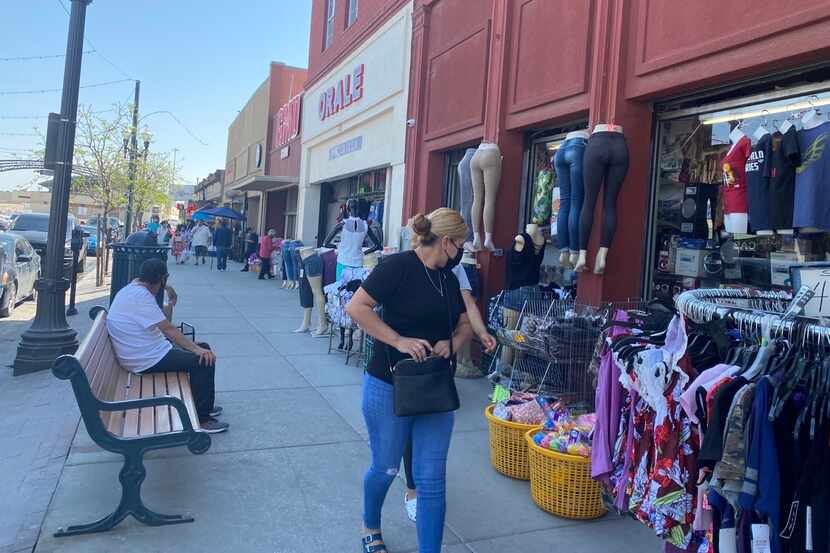 Fewer shoppers are on the street in the shopping district just across from El Paso in Ciudad...