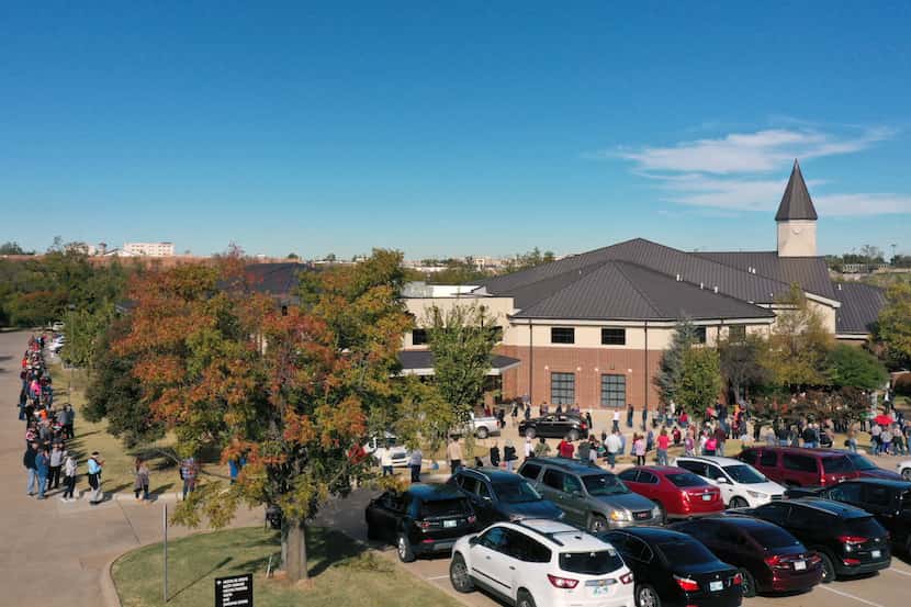 The line for early voting at a polling place in Oklahoma County wraps around the Edmond...