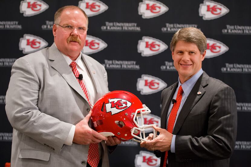 Kansas City Chiefs head coach Andy Reid, left, and Chiefs CEO Clark Hunt, pose for a photo...