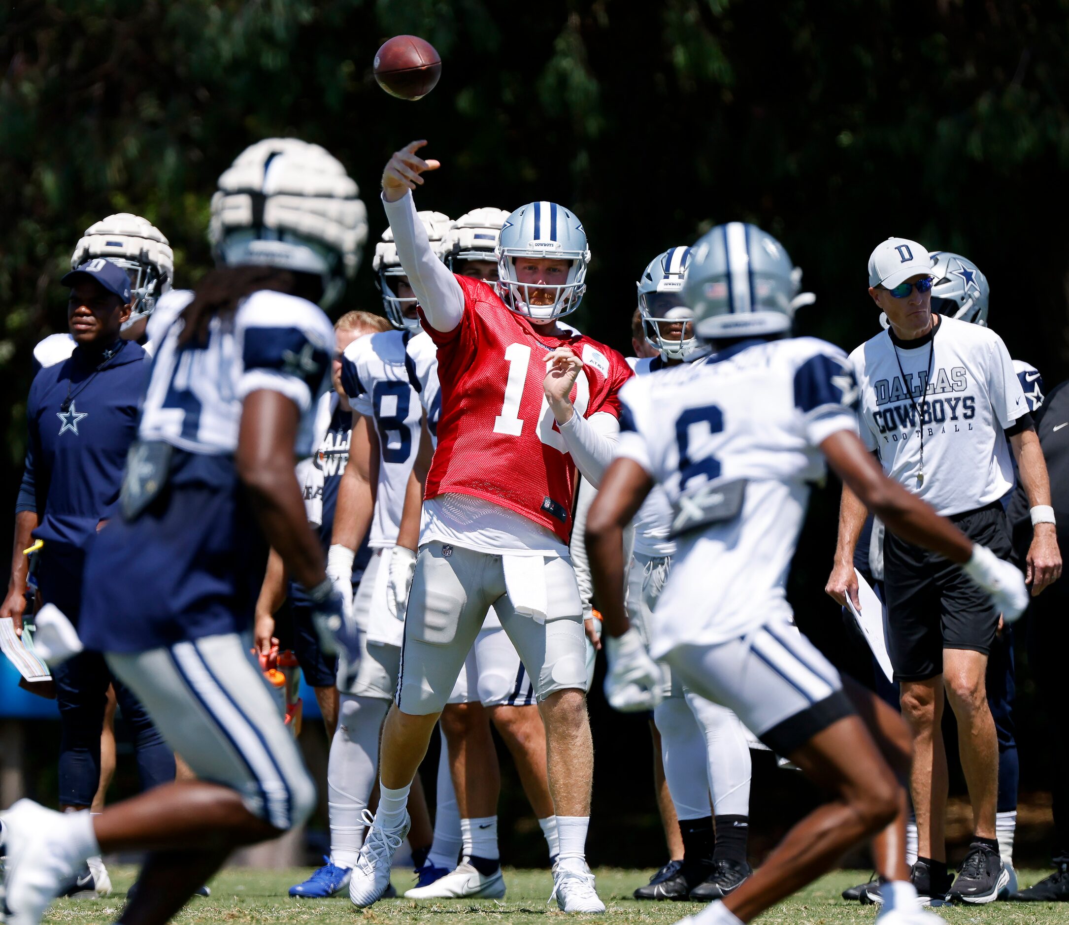 Dallas Cowboys quarterback Cooper Rush (10) throws a pass to wide receiver Noah Brown (85)...