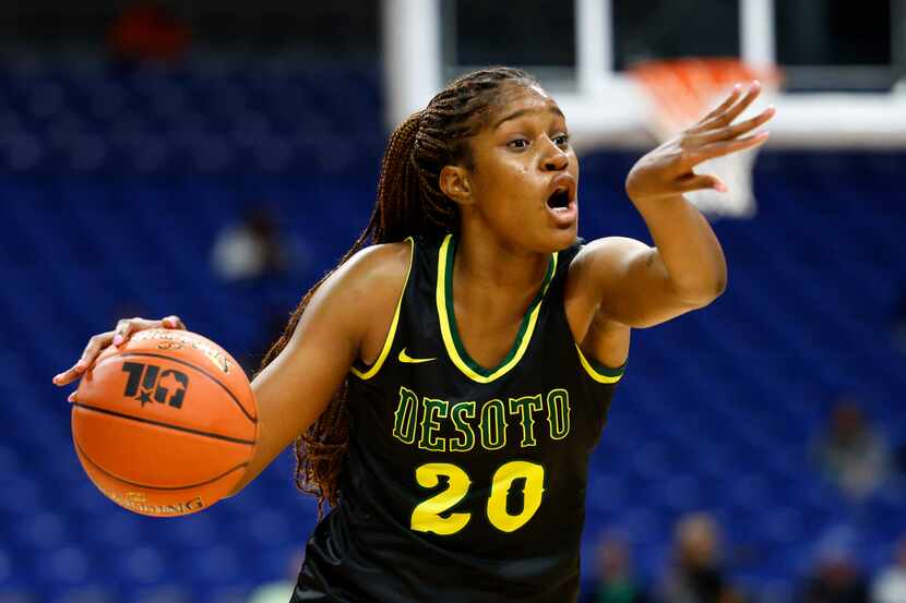 DeSoto guard Ayanna Thompson (20) directs her teammates during the first quarter of a Class...