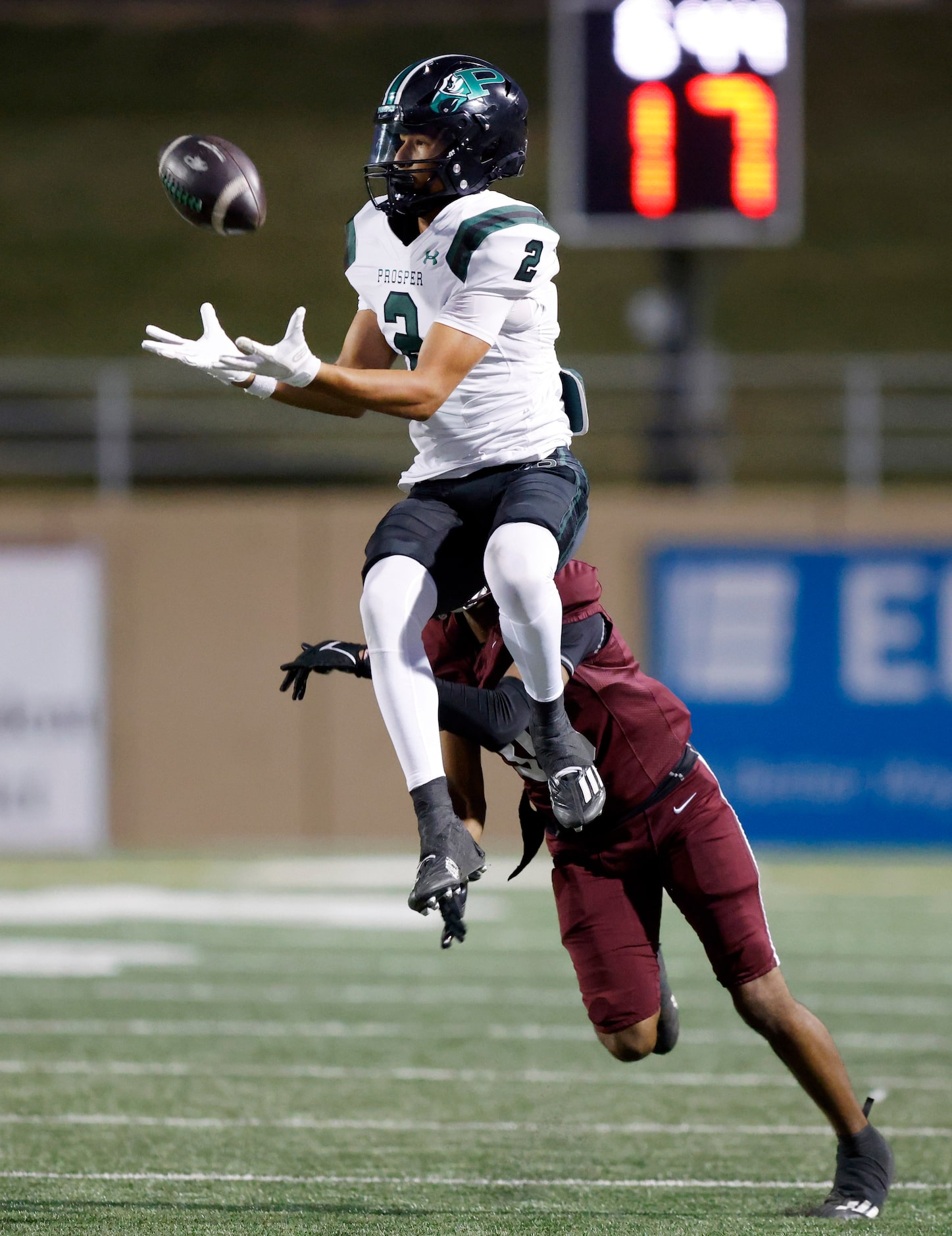 Prosper High’s Tyson Stiggers (2) goes high to catch an onside kick against receiving Plano...