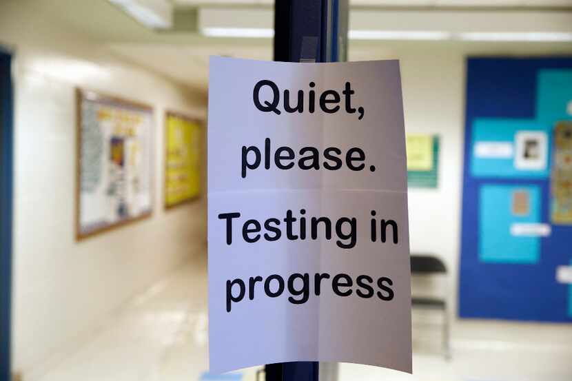 In this Jan. 17, 2016 file photo, a sign is seen at the entrance to a hall for a college...