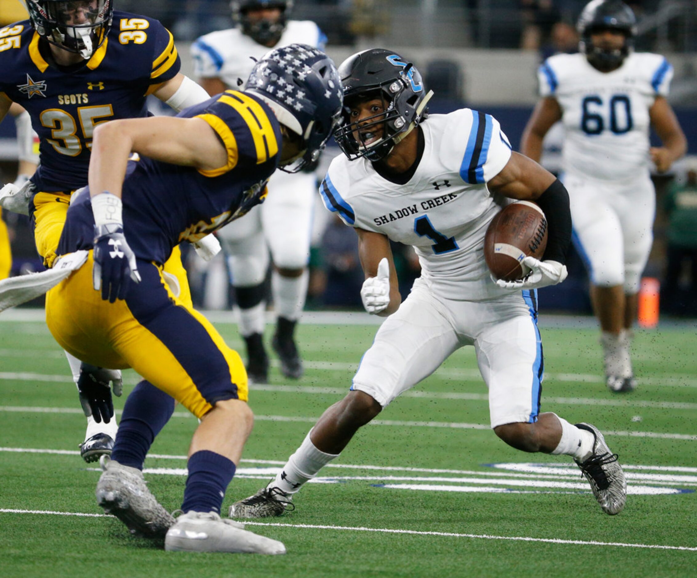 Shadow Creek's Kealon Jackson (1) jukes against Highland Park's  Kipp Miller (74) during the...