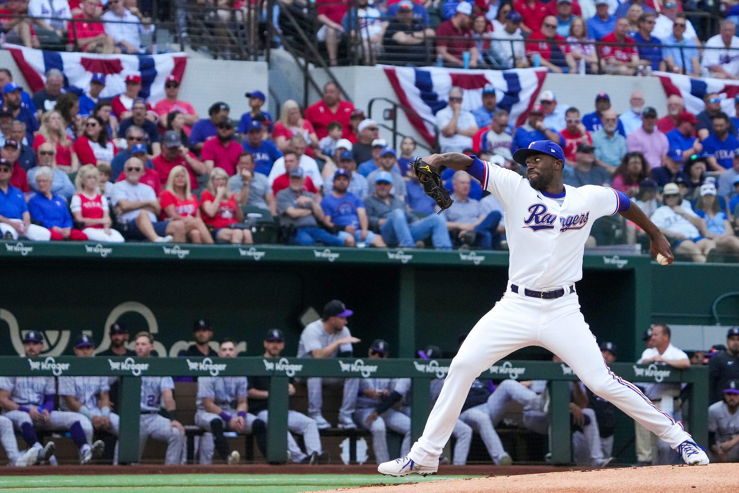 Texas Rangers pitcher Taylor Hearn delivers during the first inning of the Rangers home...