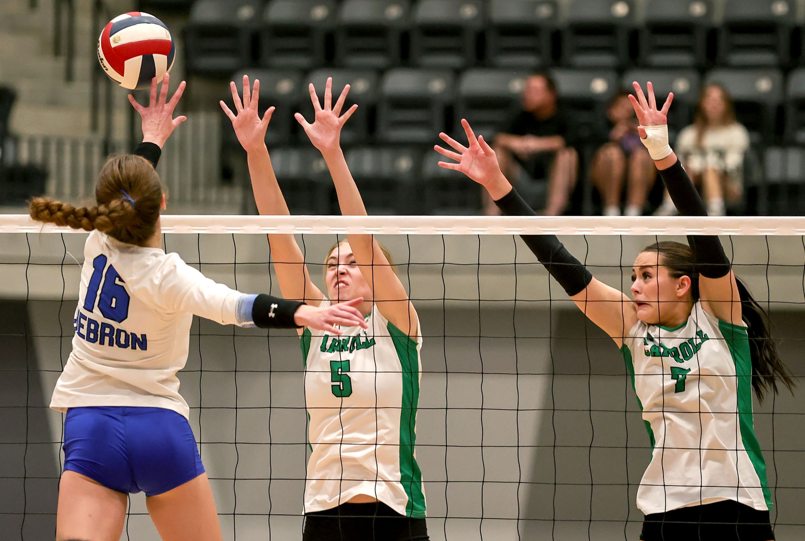 Hebron's Cadence McDonald (16) tries to tip the ball past Southlake Carroll's Abby...