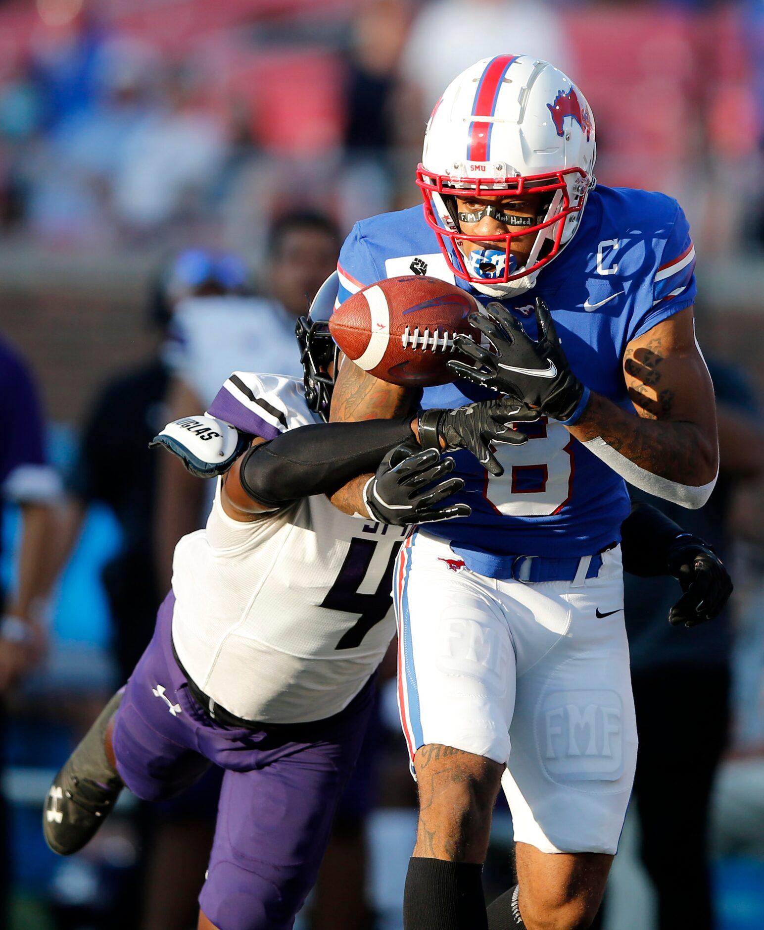 Stephen F. Austin Lumberjacks cornerback Willie Roberts (4) deflects a pass intended for...