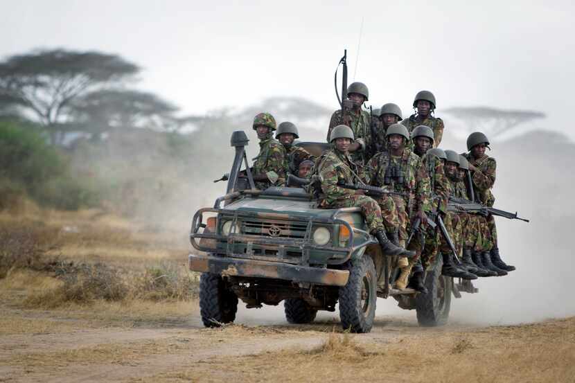 FILE - In this Monday, Feb. 20, 2012 file photo, Kenyan army soldiers ride on a vehicle at...