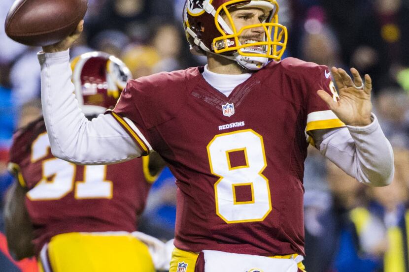 Washington Redskins quarterback Kirk Cousins (8) throws a pass during the first quarter of...