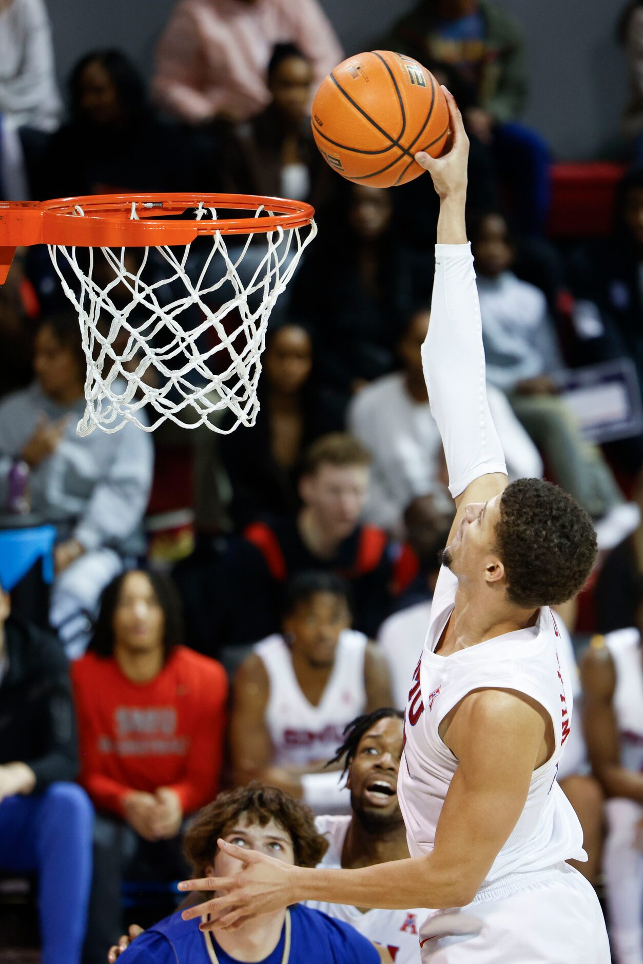 Southern Methodist forward Samuell Williamson slams against Tulsa during the second half of...