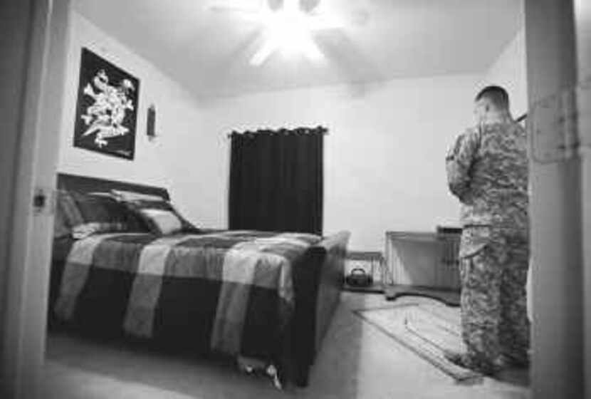 In the guest room of his apartment in Killeen, Sgt. Fahad Kamal, a medic who served in...