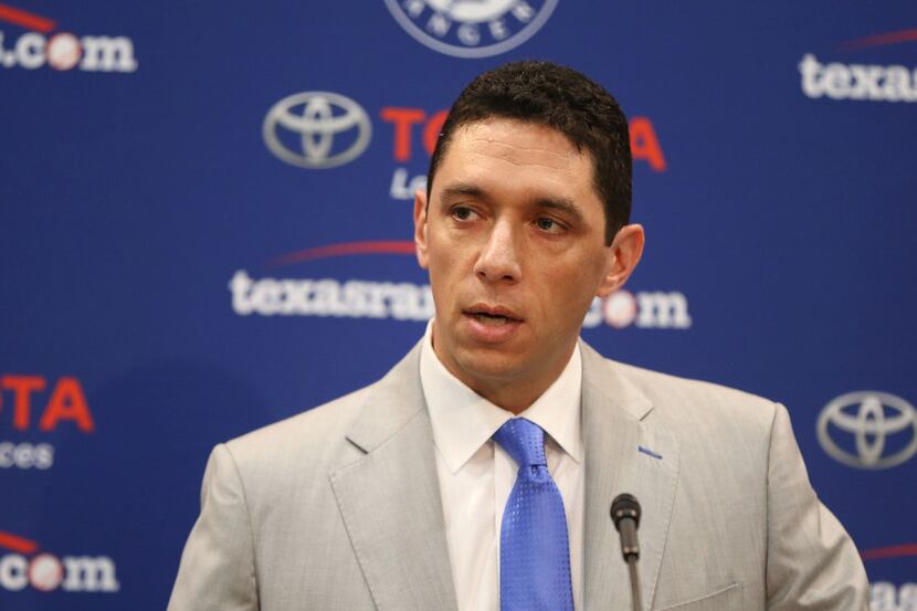 Texas Rangers General Manager Jon Daniels speaks about new manager Chris Woodward during a...