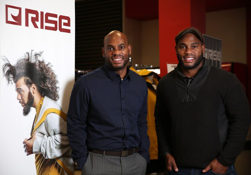 Tim Maiden (left) and Terrence Maiden stand in front of their RISE clothing store at the...