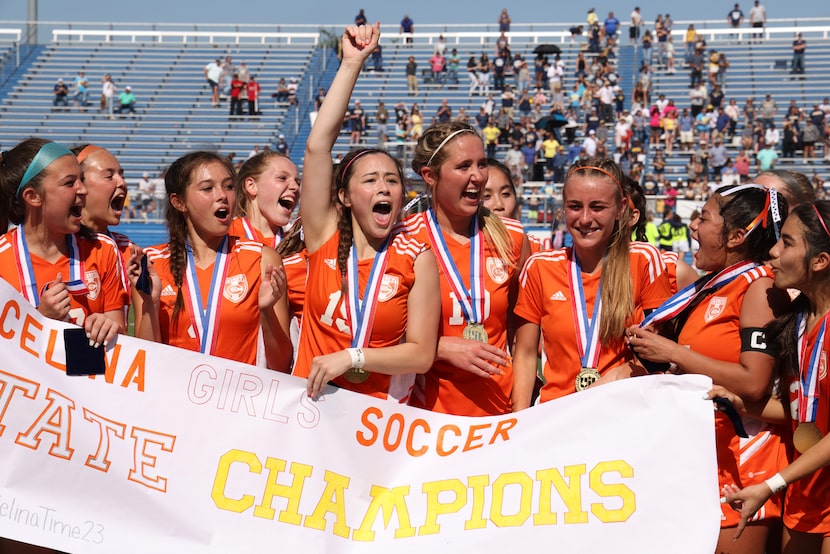 Celina's Whitney Howington (15) lets out a yell and pumps her fist surrounded by teammates...