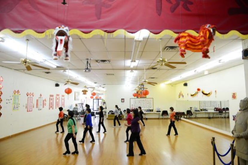 
Asian women participated in a line dancing class on Feb. 11 at the Dallas Chinese Community...