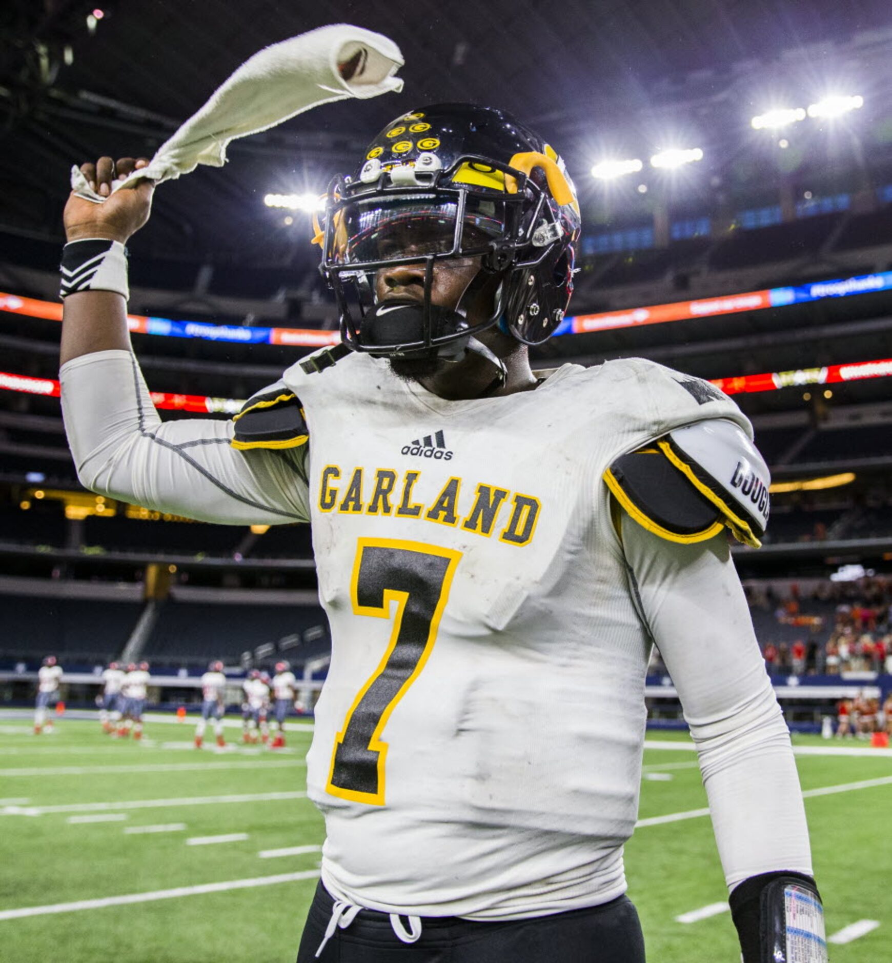 Garland quarterback Jacoby Williams (7) celebrates a 20-16 win against Rockwall-Heath on...