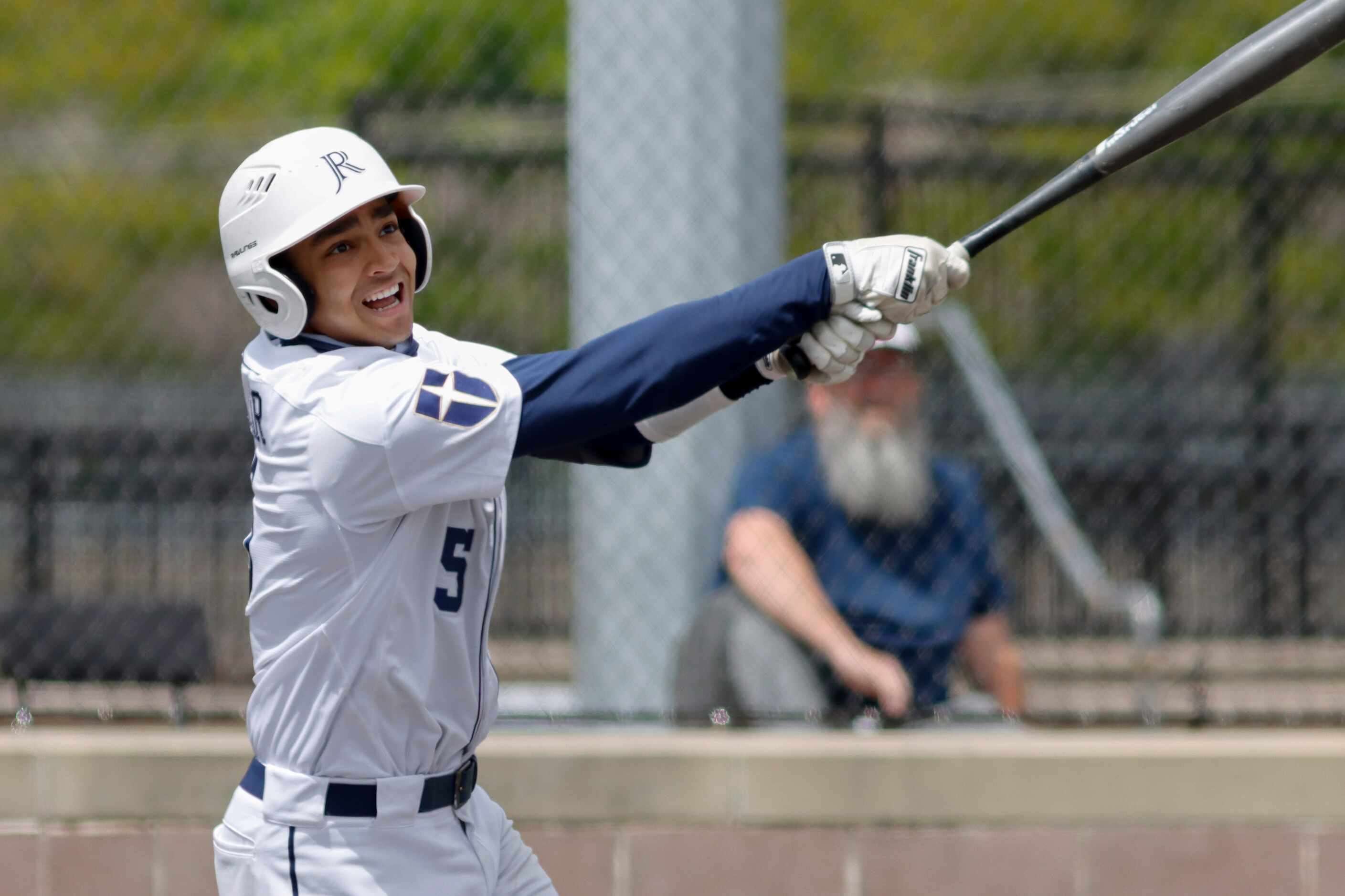 Jesuit shortstop Jordan Lawlar swings for a pitch during a district 7-6A game against...