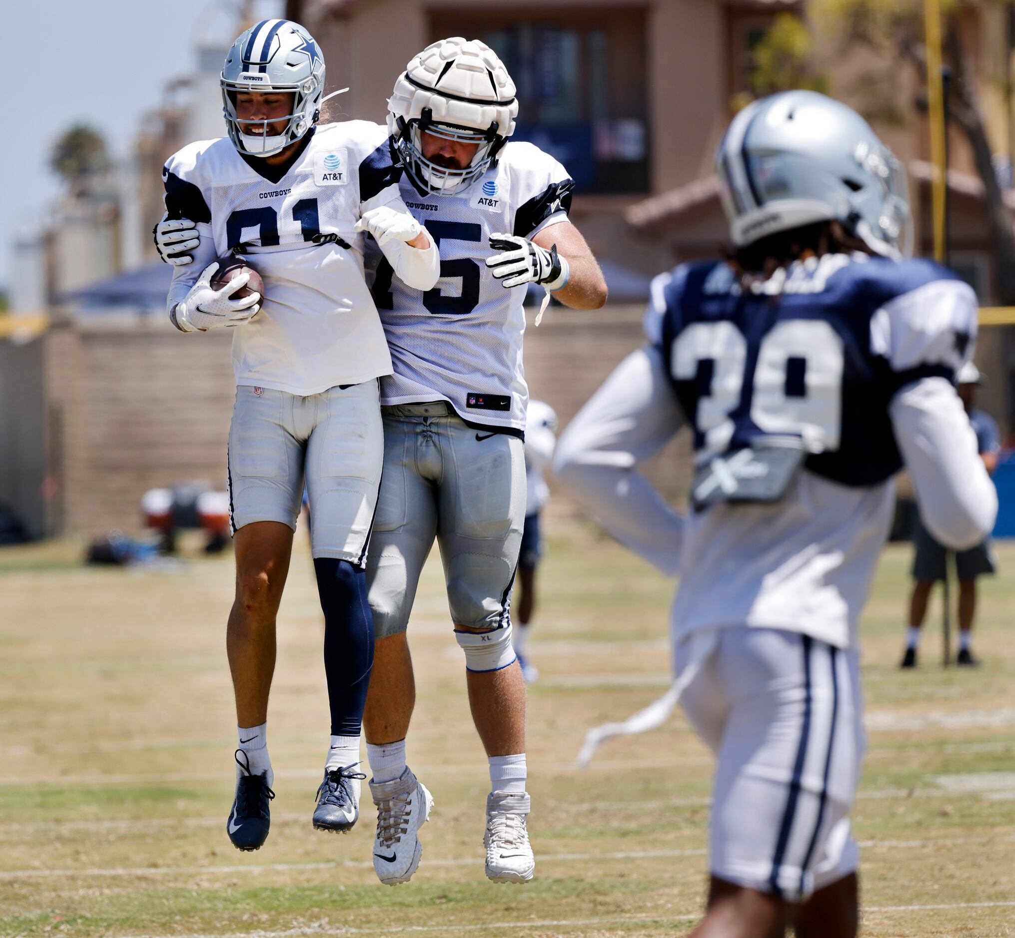 Dallas Cowboys wide receiver Simi Fehoko (81) is congratulated on his touchdown pass by...