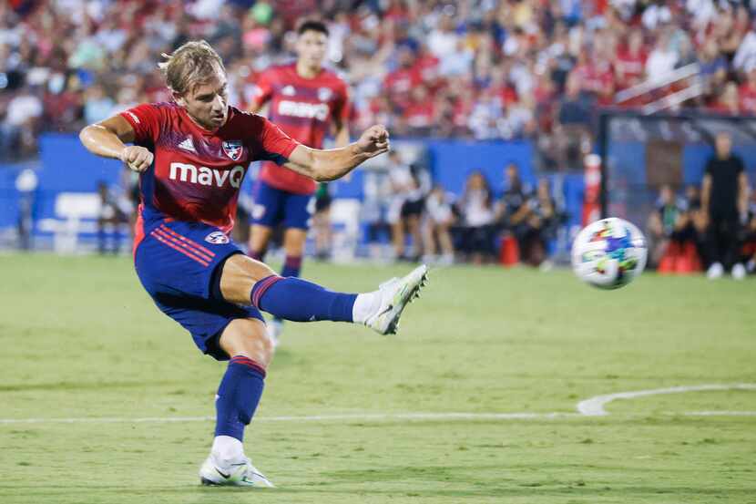 FC Dallas midfielder Paxton Pomykal takes a shot against LA Galaxy during the first half of...