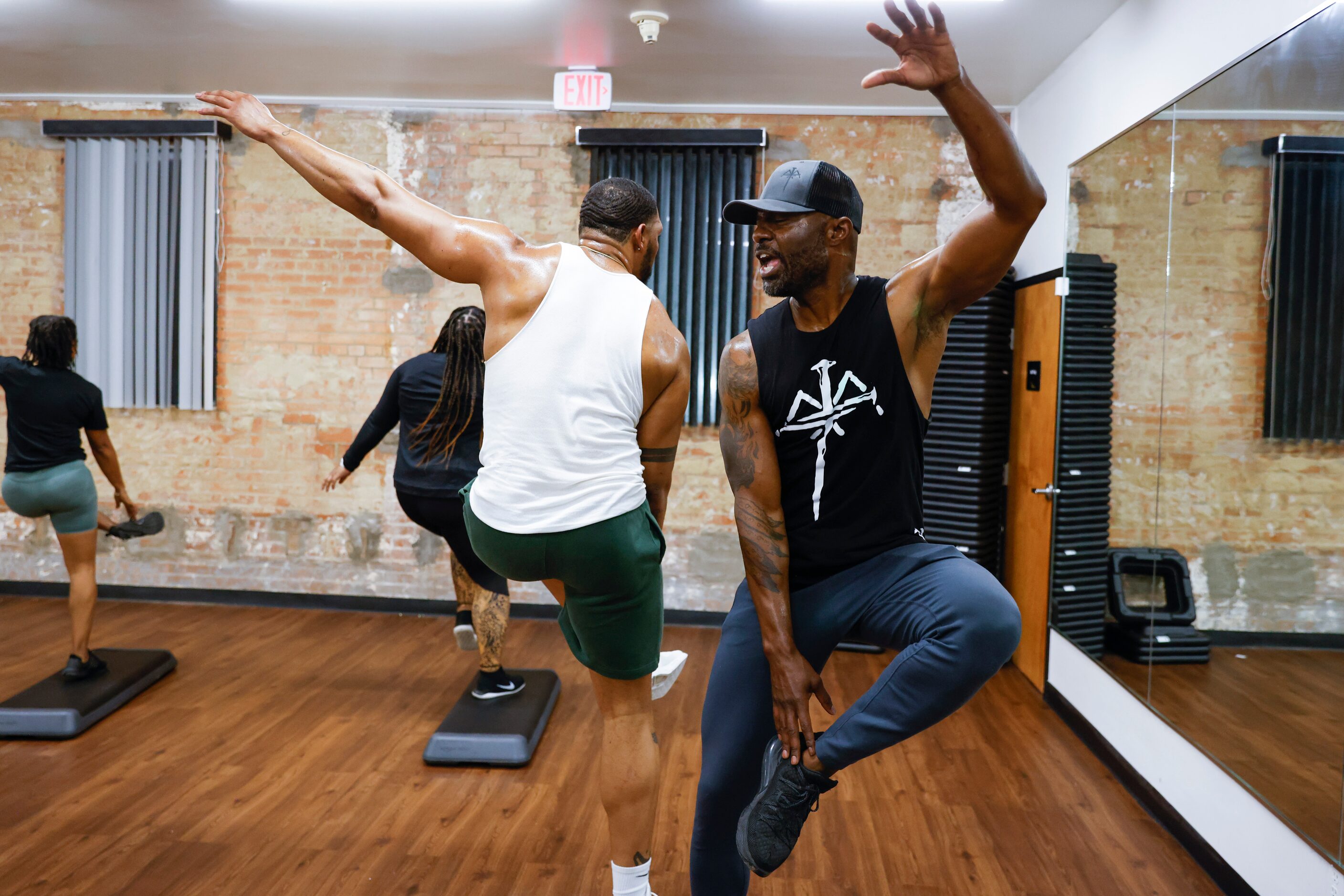 Fredrick Robinson, right, of Grand Prairie leads a Steppin and Reppin session at Abounding...