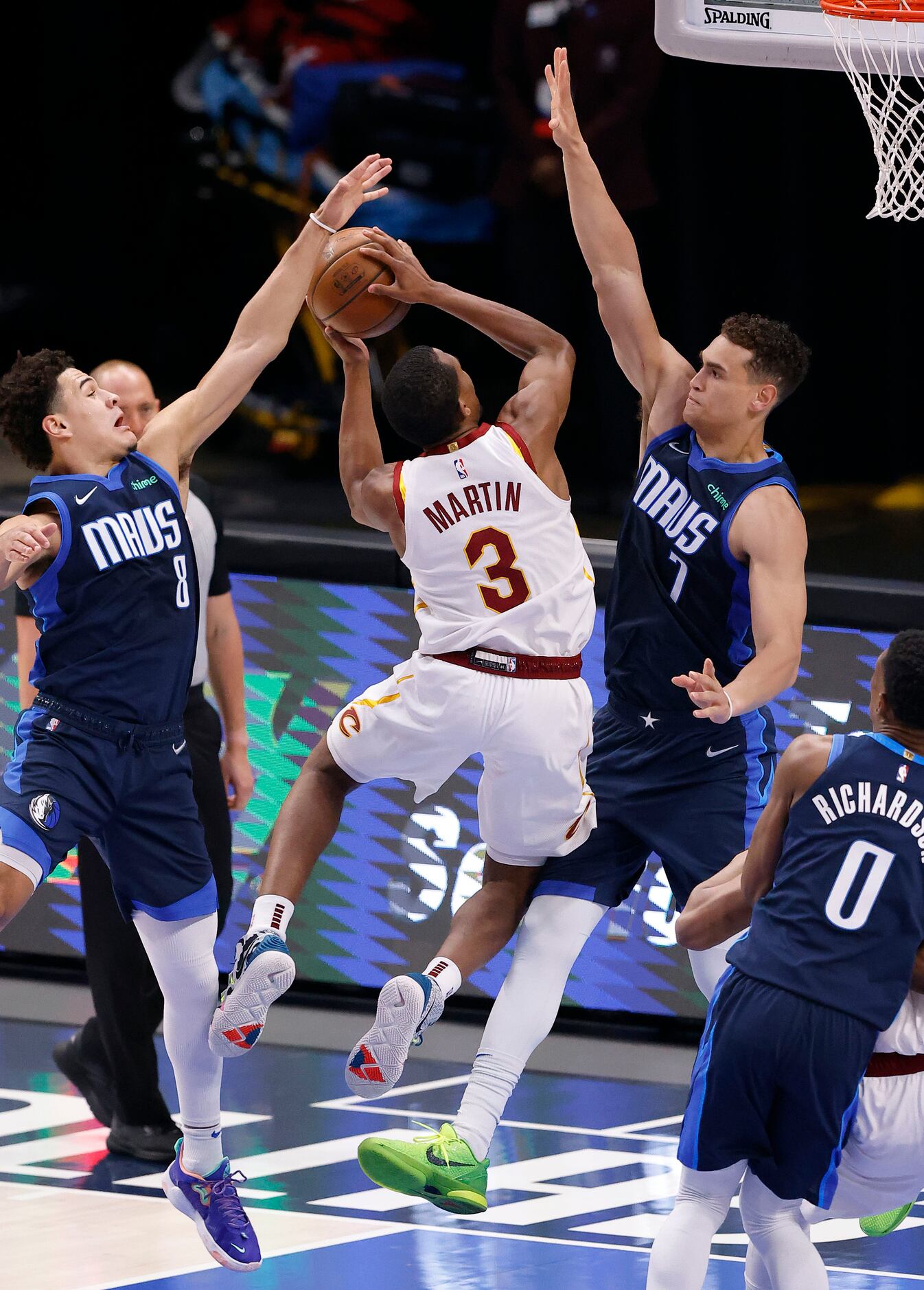 Dallas Mavericks guard Josh Green (8) blocks a shot by Cleveland Cavaliers guard Jeremiah...