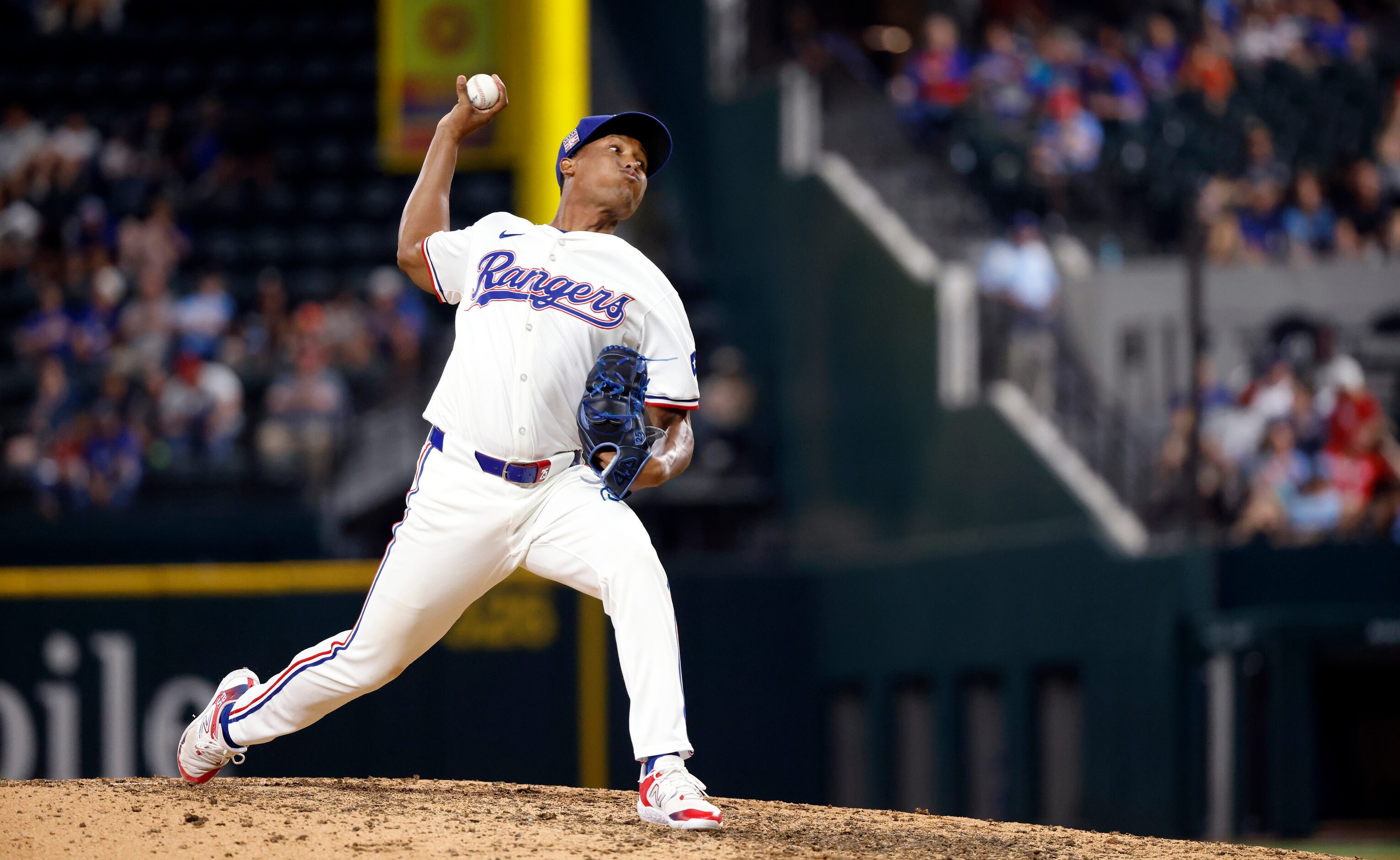 Texas Rangers pitcher José Leclerc throws against the Baltimore Orioles in the ninth inning...