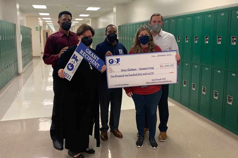 Delivery teams from the Garland Education Foundation surprised teachers, support staff and...
