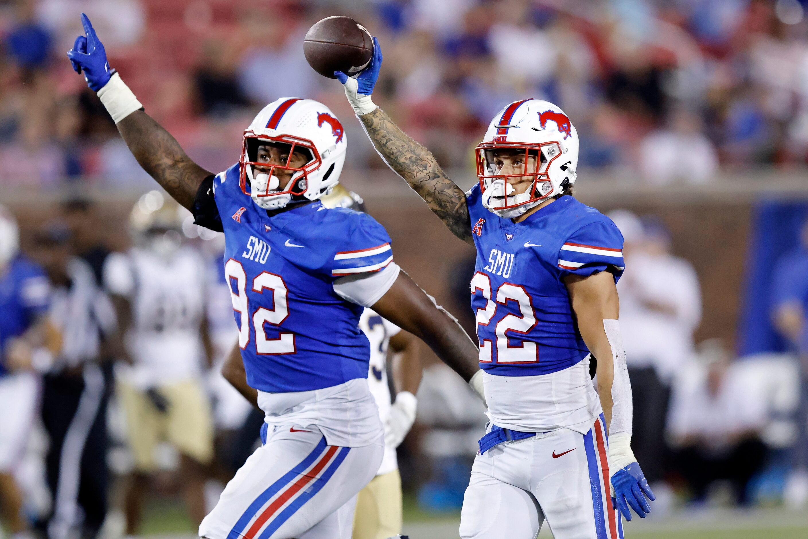 Southern Methodist Mustangs safety Nick Roberts (22) celebrates his third quarter fumble...