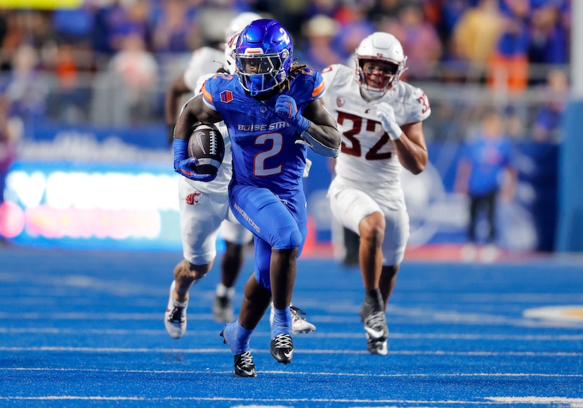 Boise State running back Ashton Jeanty (2) breaks away from the Washington State defense in...