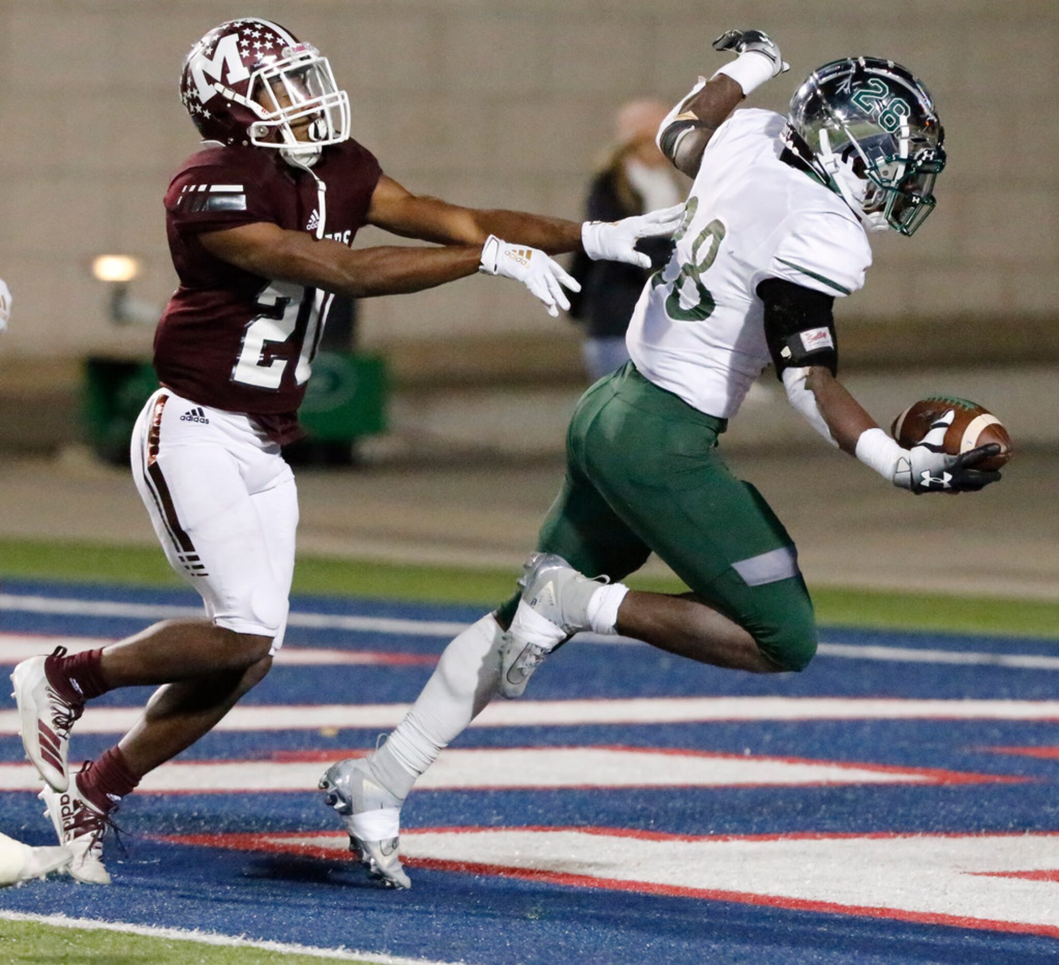 Prosper High School running back JT Lane (28) scores a touchdown near the end of the game...