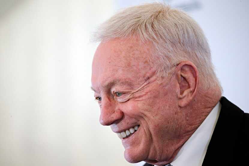 Dallas Cowboys owner Jerry Jones talks with reporters about the drafting of USC tackle Tyron...
