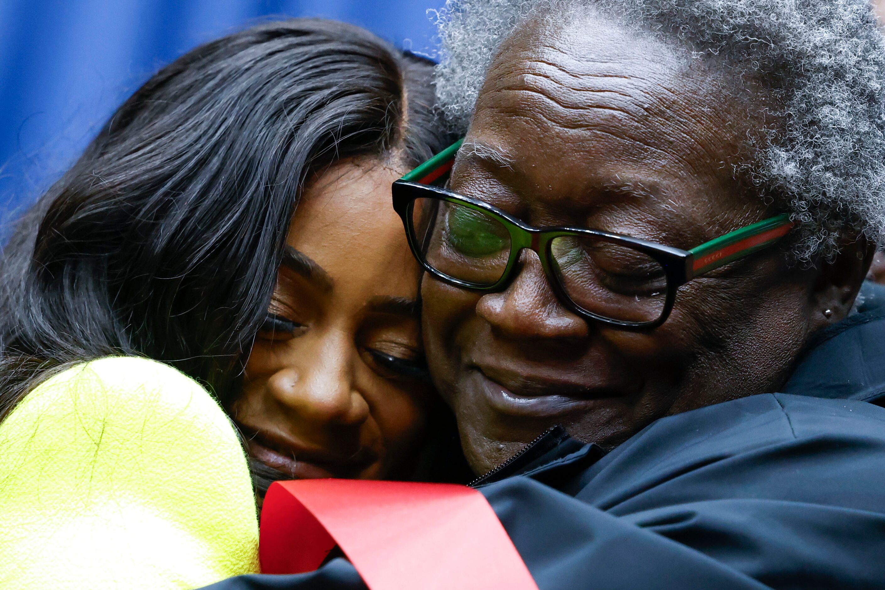 100 meters world champion Sha'Carri Richardson (left) embraces her grandmother Betty Harp...