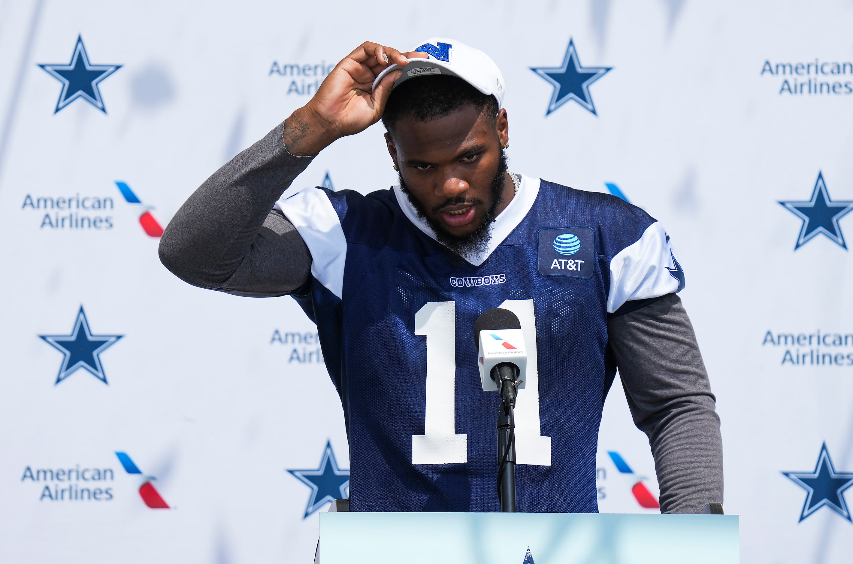 Dallas Cowboys linebacker Micah Parsons addresses reporters after a training camp practice...