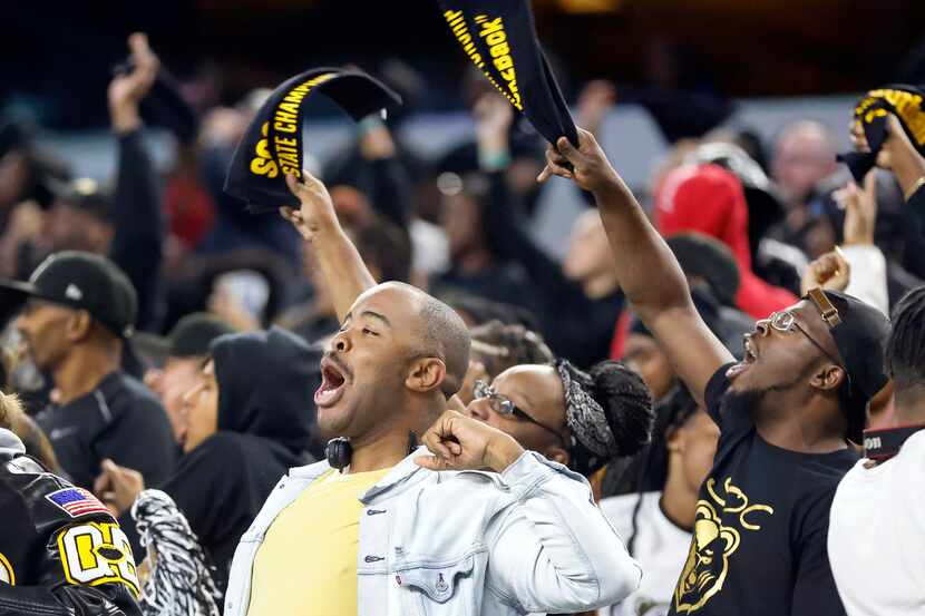 South Oak Cliff fans cheer on their team during the third quarter of the Class 5A Division...