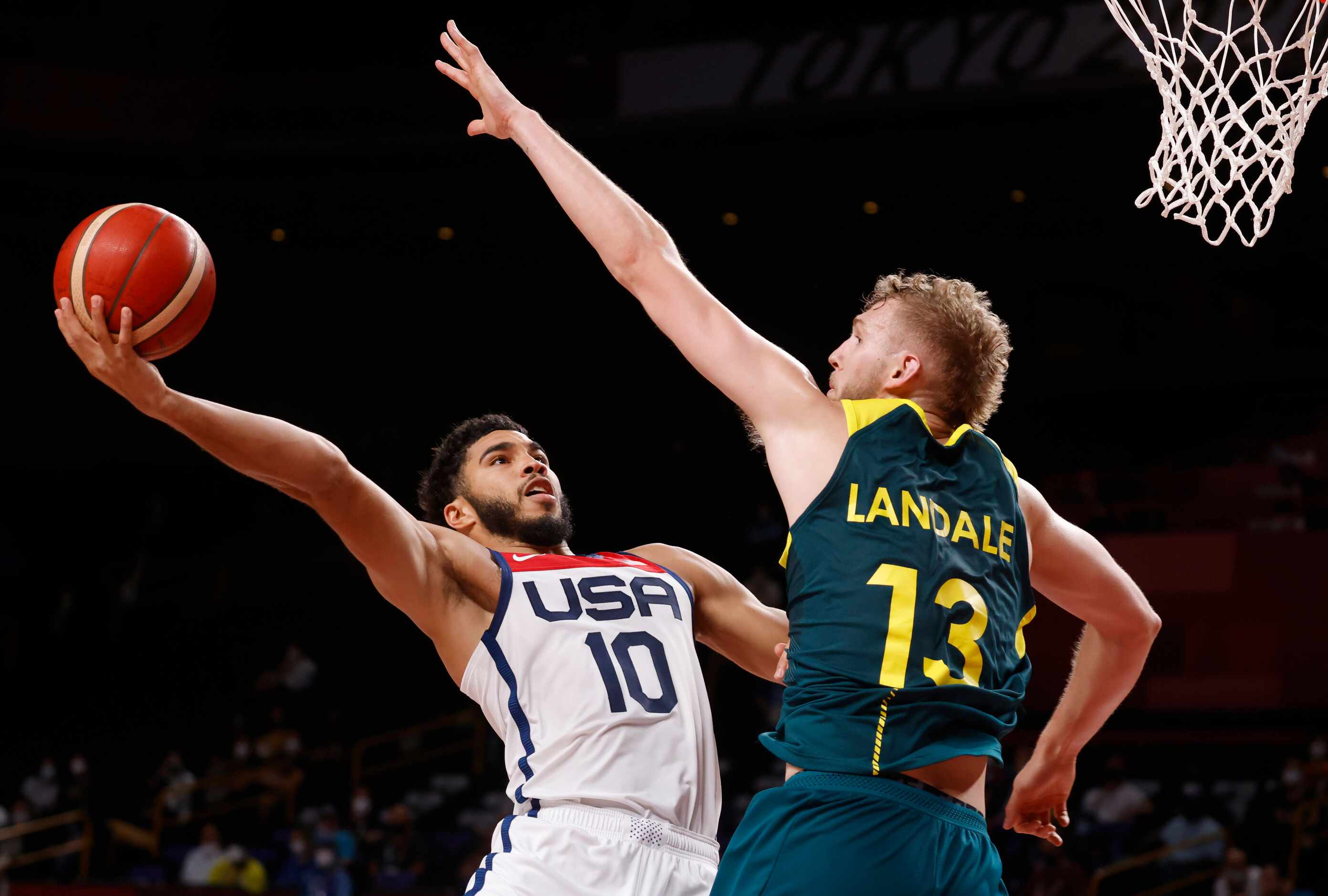 USA’s Jayson Tatum (10) attempts to shoot over Australia’s Jock Landale (13) during the...