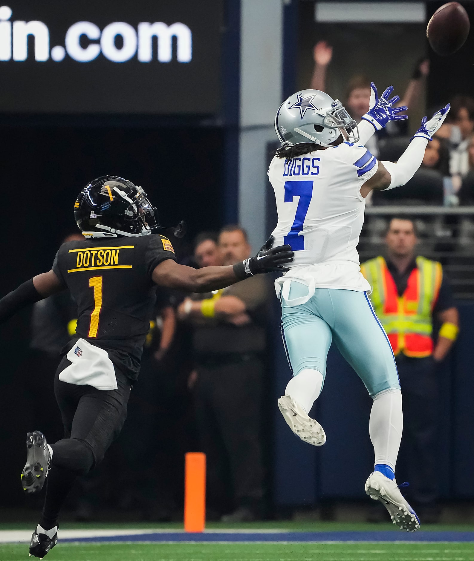 Dallas Cowboys cornerback Trevon Diggs (7) intercepts a pass intended for Washington...