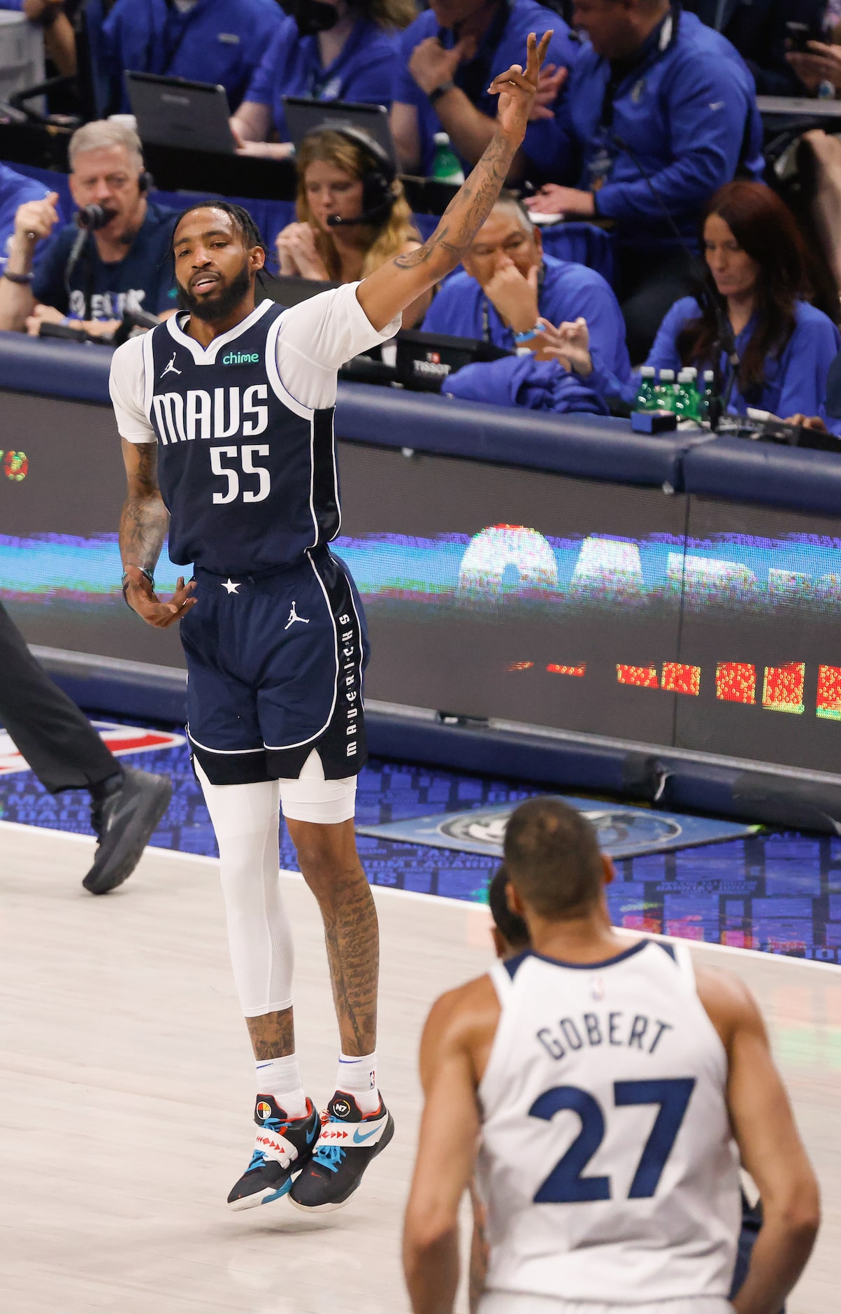 Dallas Mavericks forward Derrick Jones Jr. (55) reacts to his second quarter 3-pointer...