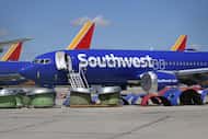 Southwest Airlines Boeing 737 MAX aircraft are parked on the tarmac after being grounded at...