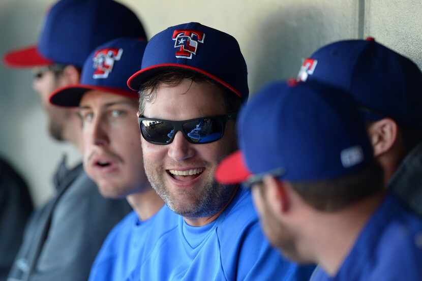 Feb 26, 2013; Surprise, AZ, USA; Texas Rangers first baseman Lance Berkman (27) laughs in...