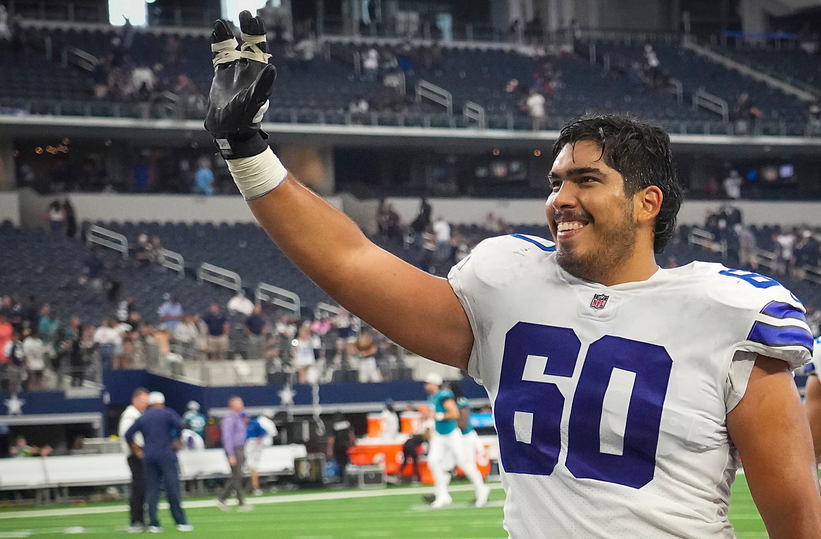 Dallas Cowboys offensive tackle Isaac Alarcon (60) waits for play to begin  during the second half of an NFL preseason football game against the  Jacksonville Jaguars, Saturday, Aug. 12, 2023, in Arlington