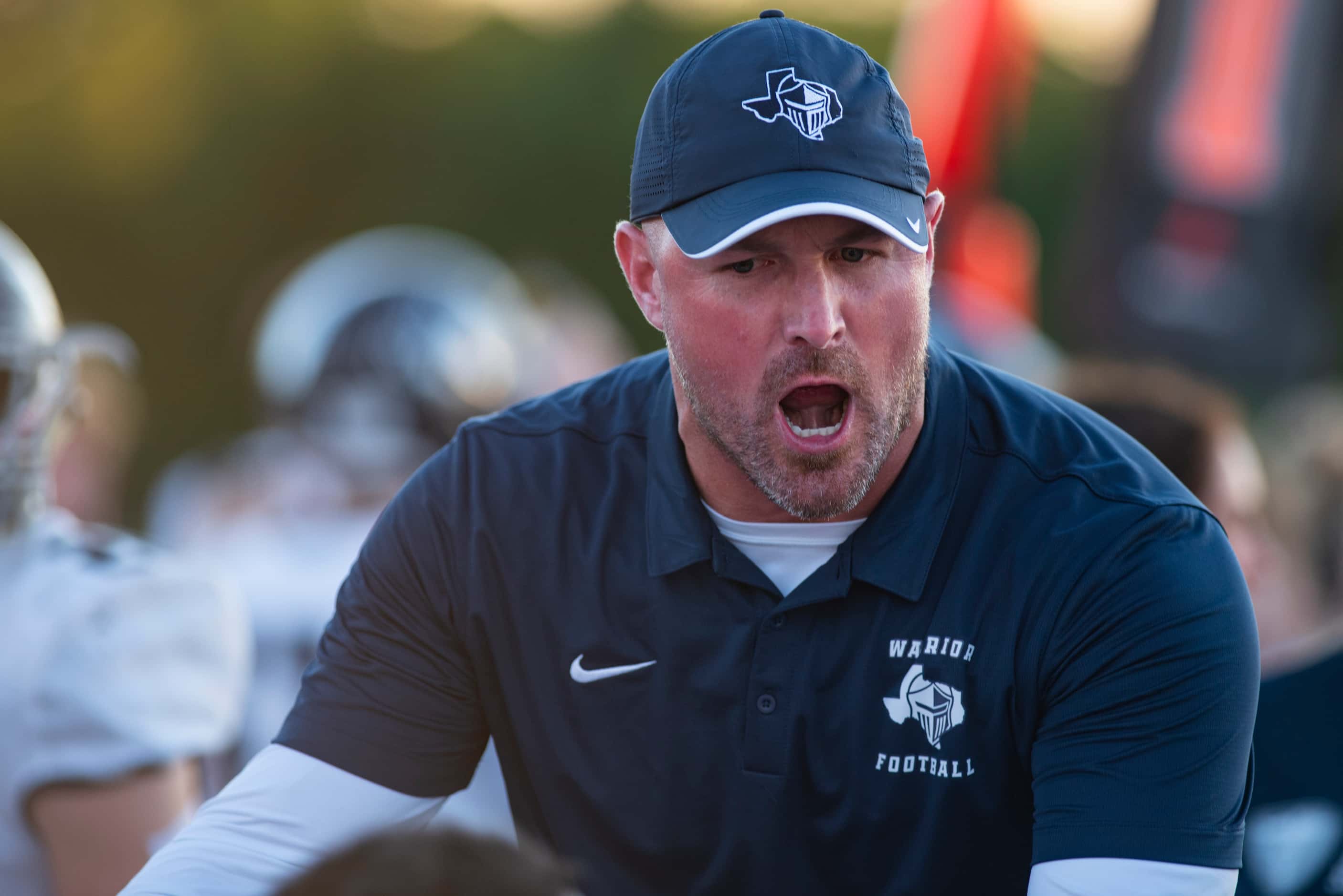 Argyle Liberty Christian Head Coach Jason Witten yells at his players after a bad possession...
