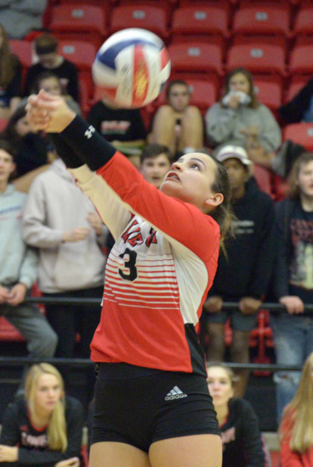 Lovejoy's Callie Kemohah returns a serve during a high school volleyball match between...